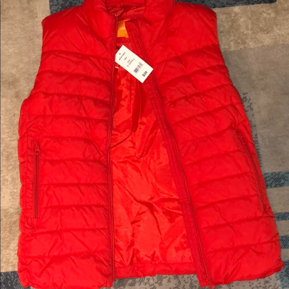 Orange redish vest